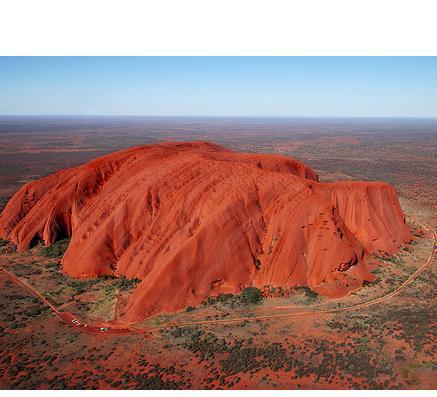 Ayers Rock（A massive reddish-brown rock located in the central part of ...