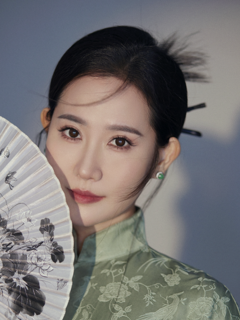 Wan Li（A young female singer from Mainland China, and an Associate ...